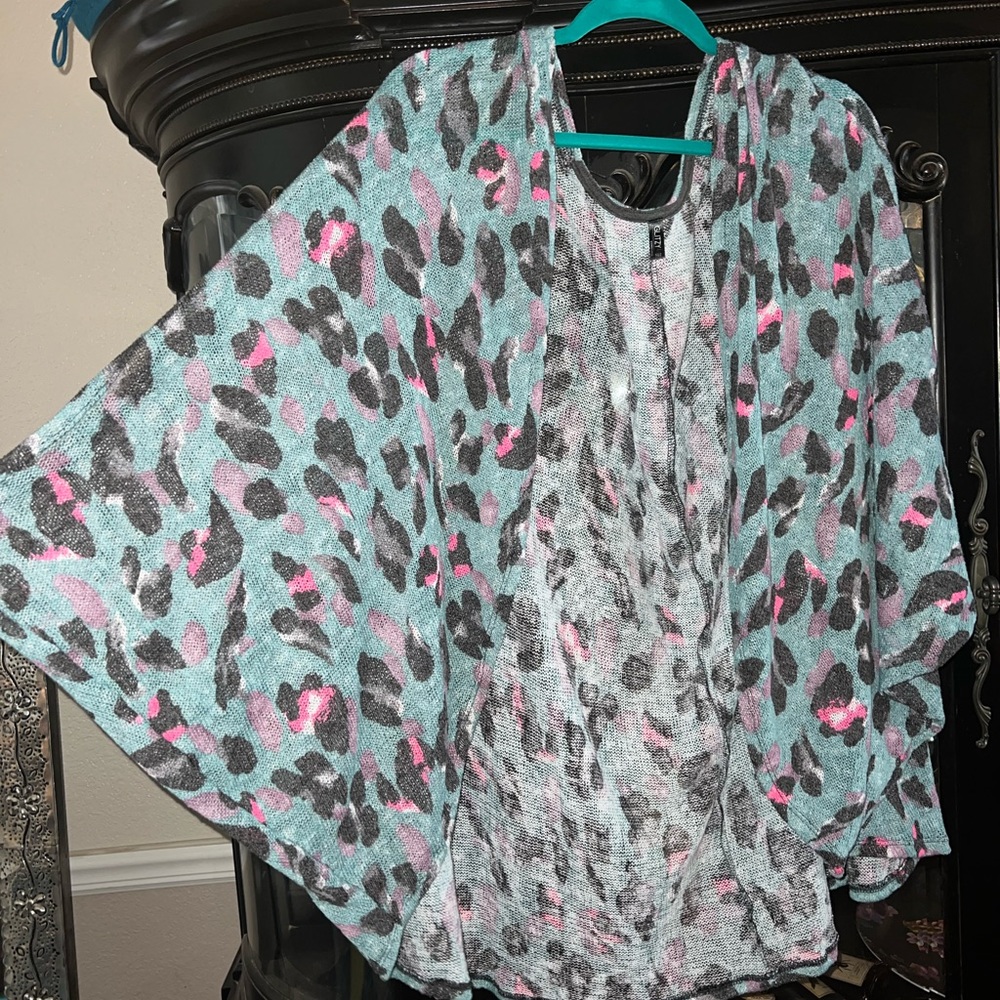Cheetah batwing shrug.